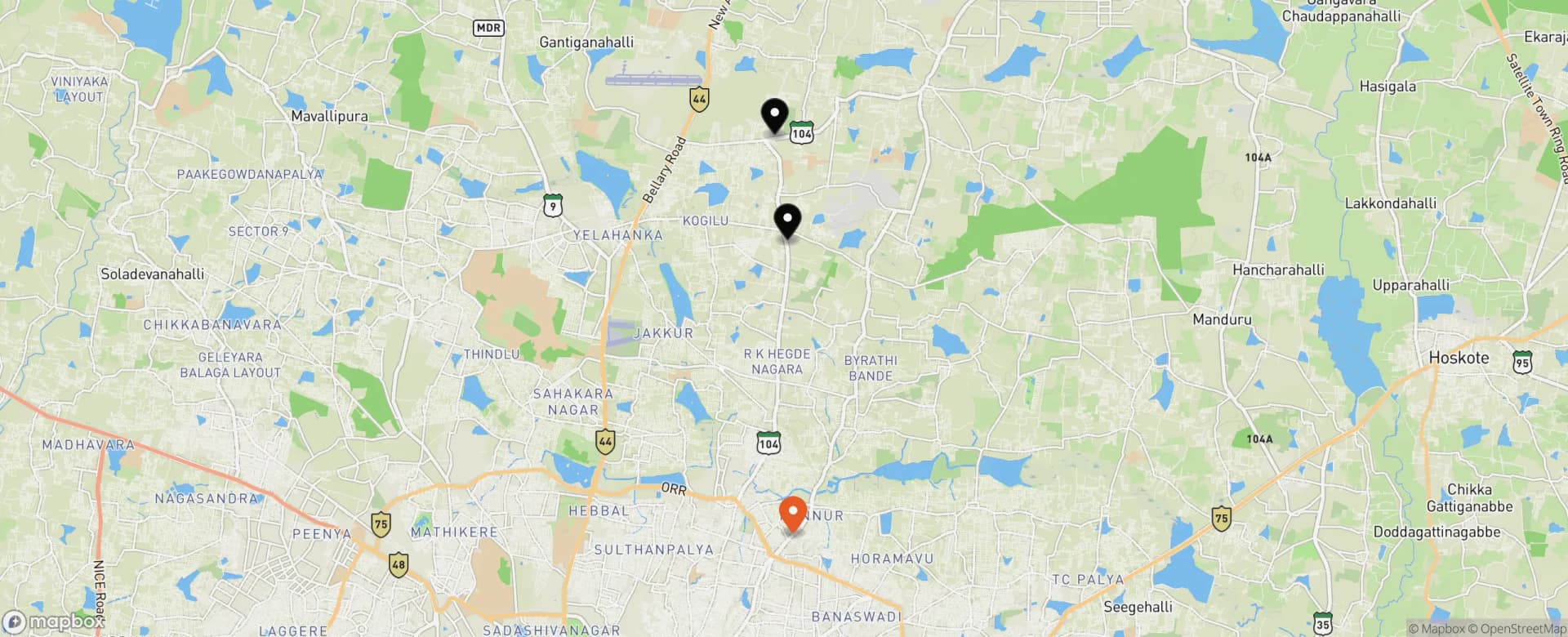Hennur–Thanisandra Road map with 3 covered projects pinned